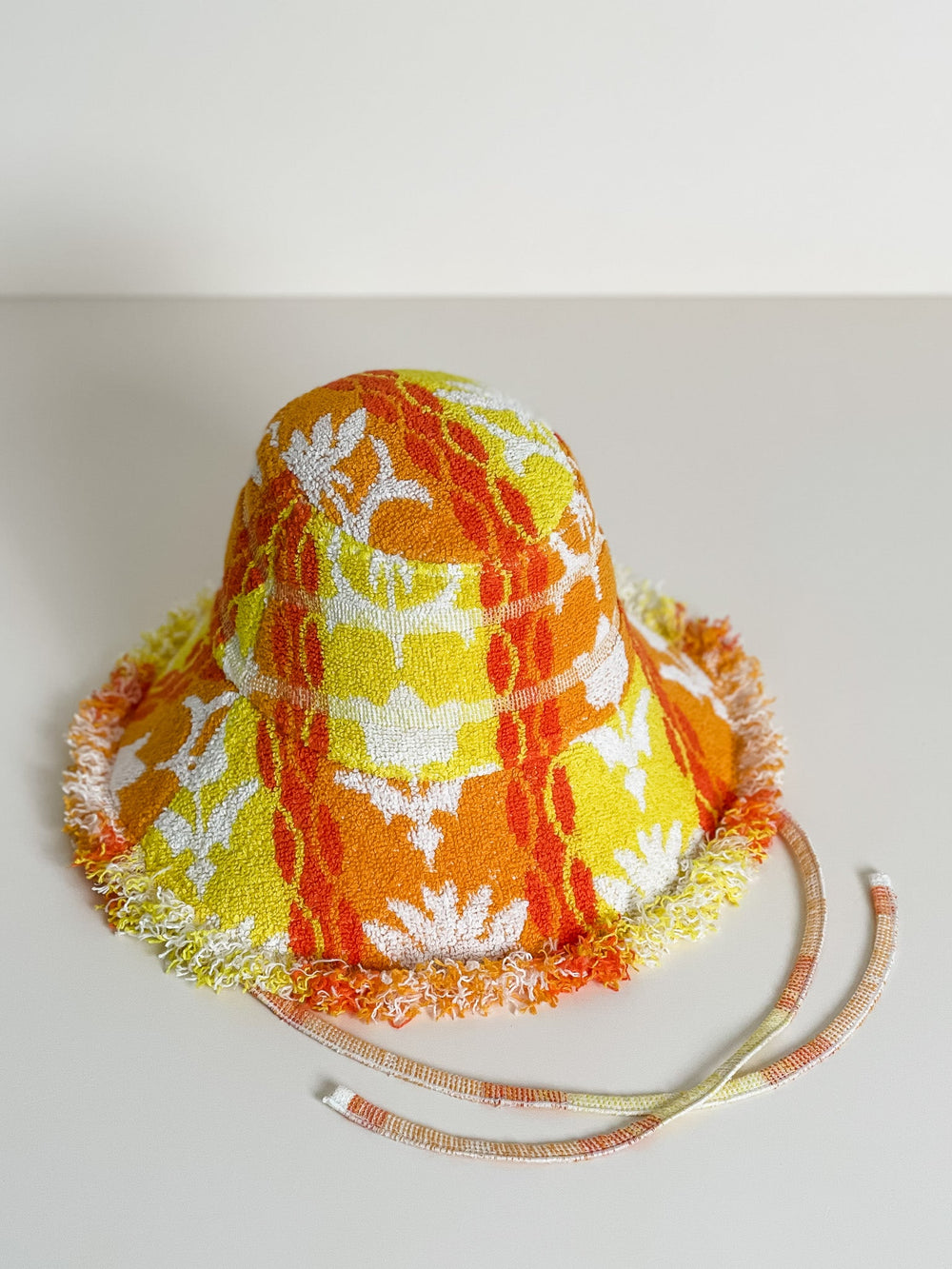JONI #131 SMALL, handmade by expert artisans from upcycled vintage towels, in Sydney.