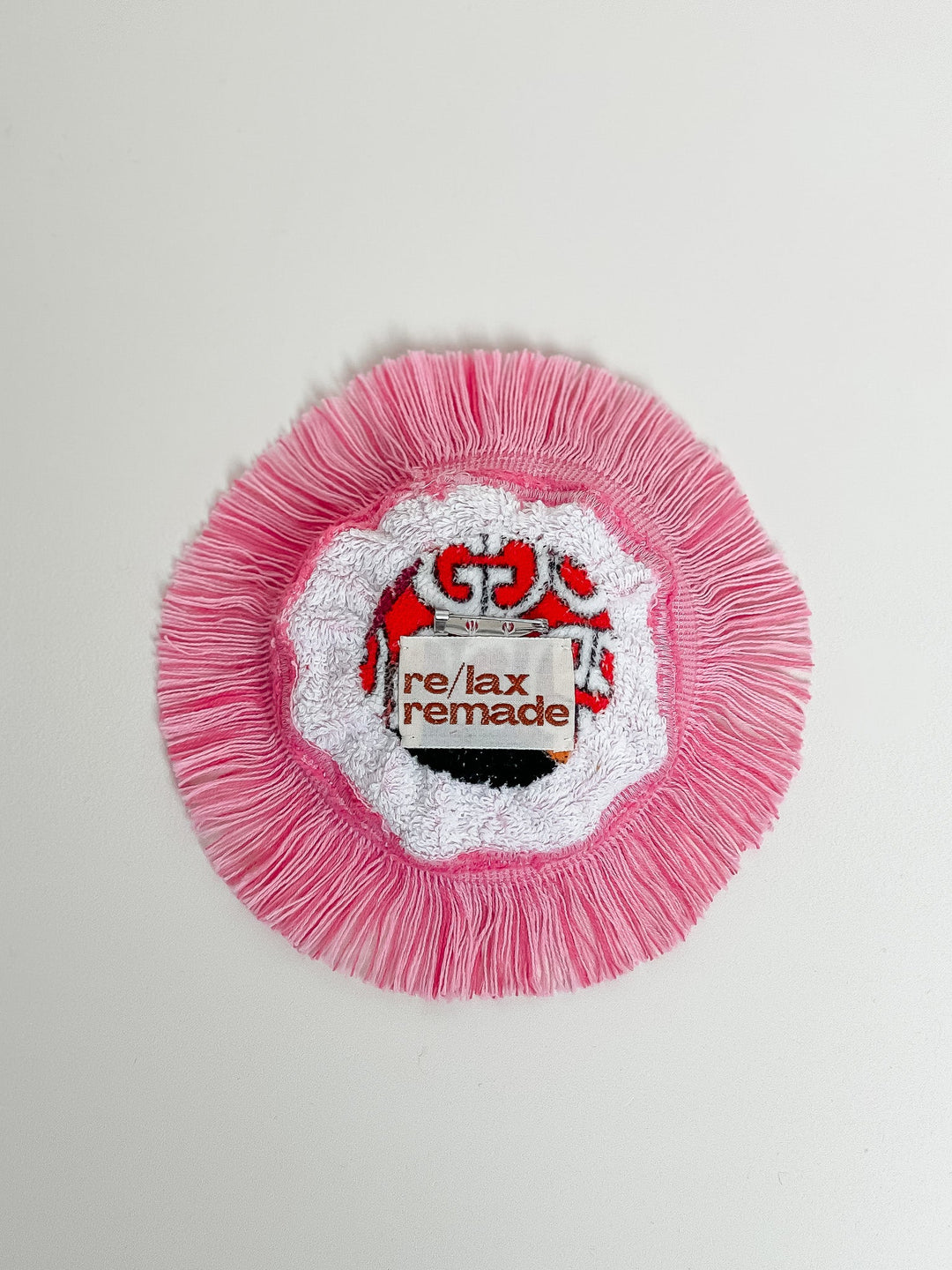 Re/lax Rosette #12 by Sophia handmade by expert artisans from upcycled vintage towels, in Sydney.